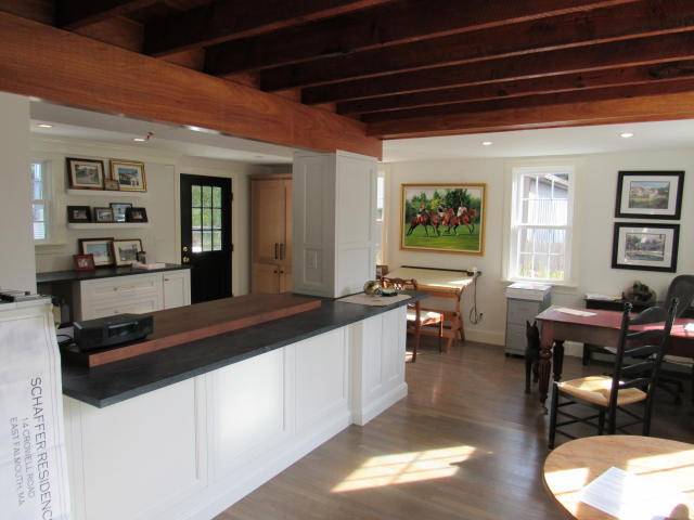 182 Ost -w Barn Road Osterville, MA 02655 - Photo 8 of 19 a living room with stainless steel appliances kitchen island granite countertop furniture and a large window