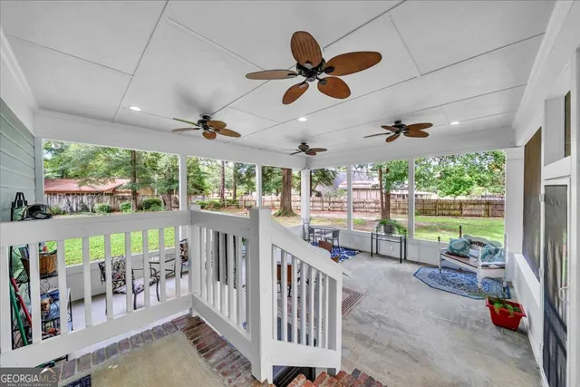 a view of a porch and garden