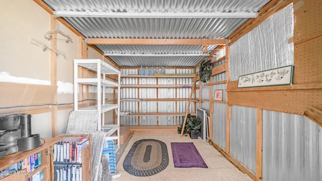 a view of a hallway with washer and dryer