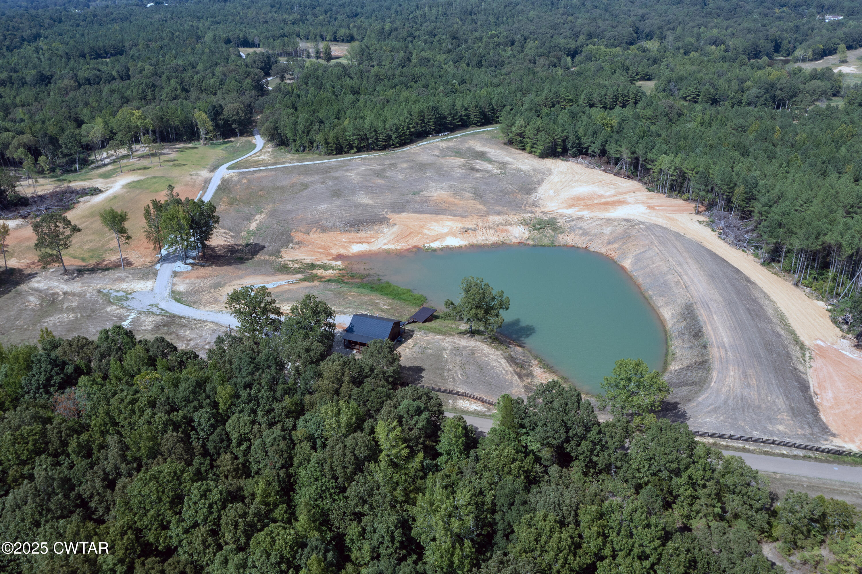 820 Tyson Road Toone, TN 38381 - Photo 15 of 31 an aerial view of a house with mountain view