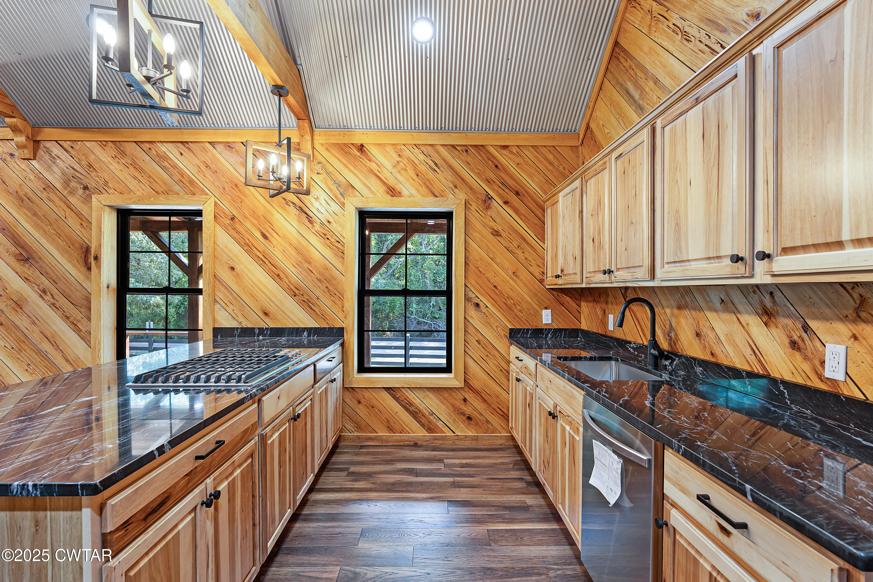 820 Tyson Road Toone, TN 38381 - Photo 17 of 31 a view of a kitchen with wooden floor and staircase