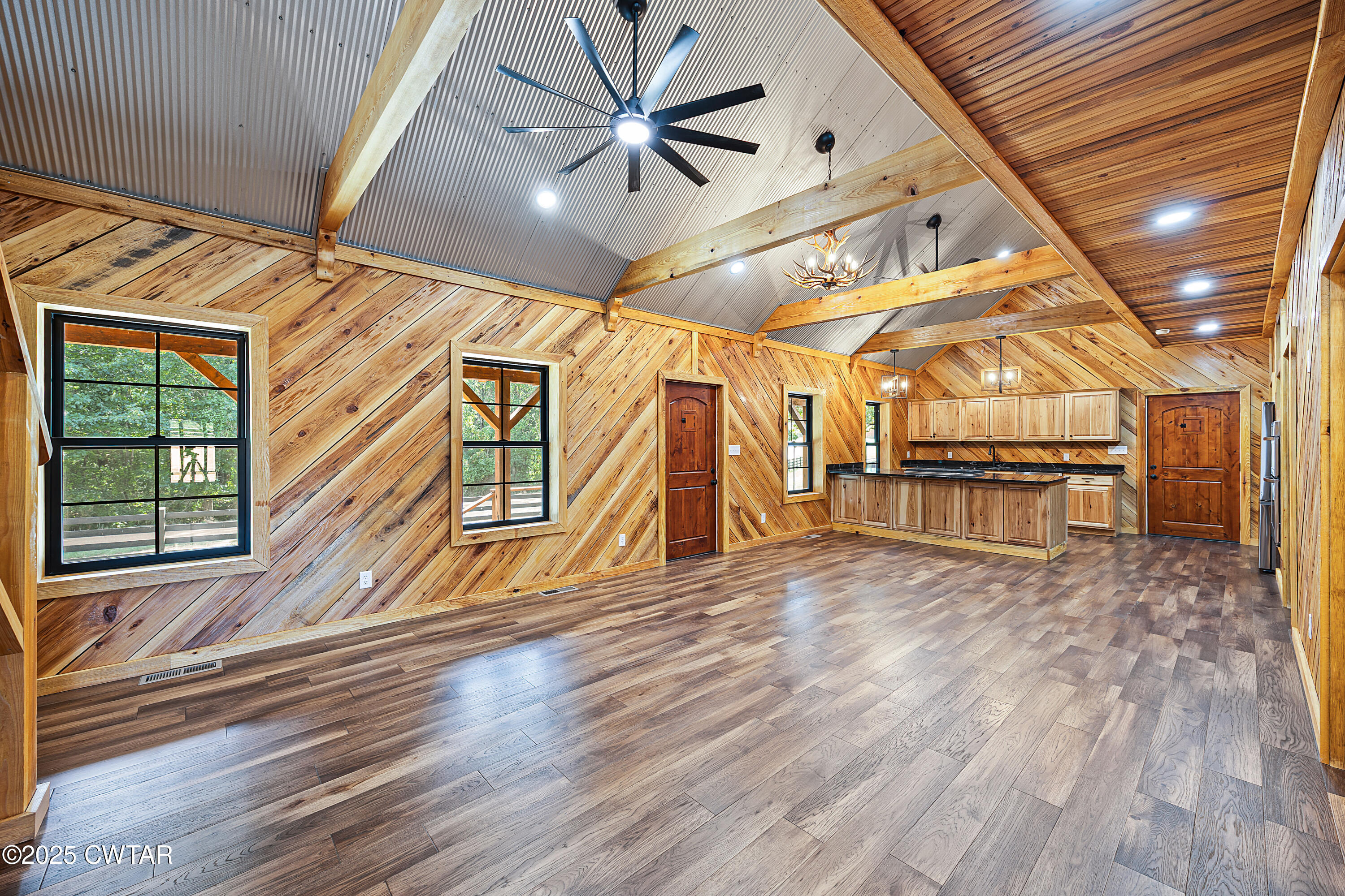 820 Tyson Road Toone, TN 38381 - Photo 21 of 31 a view of a room with wooden floor