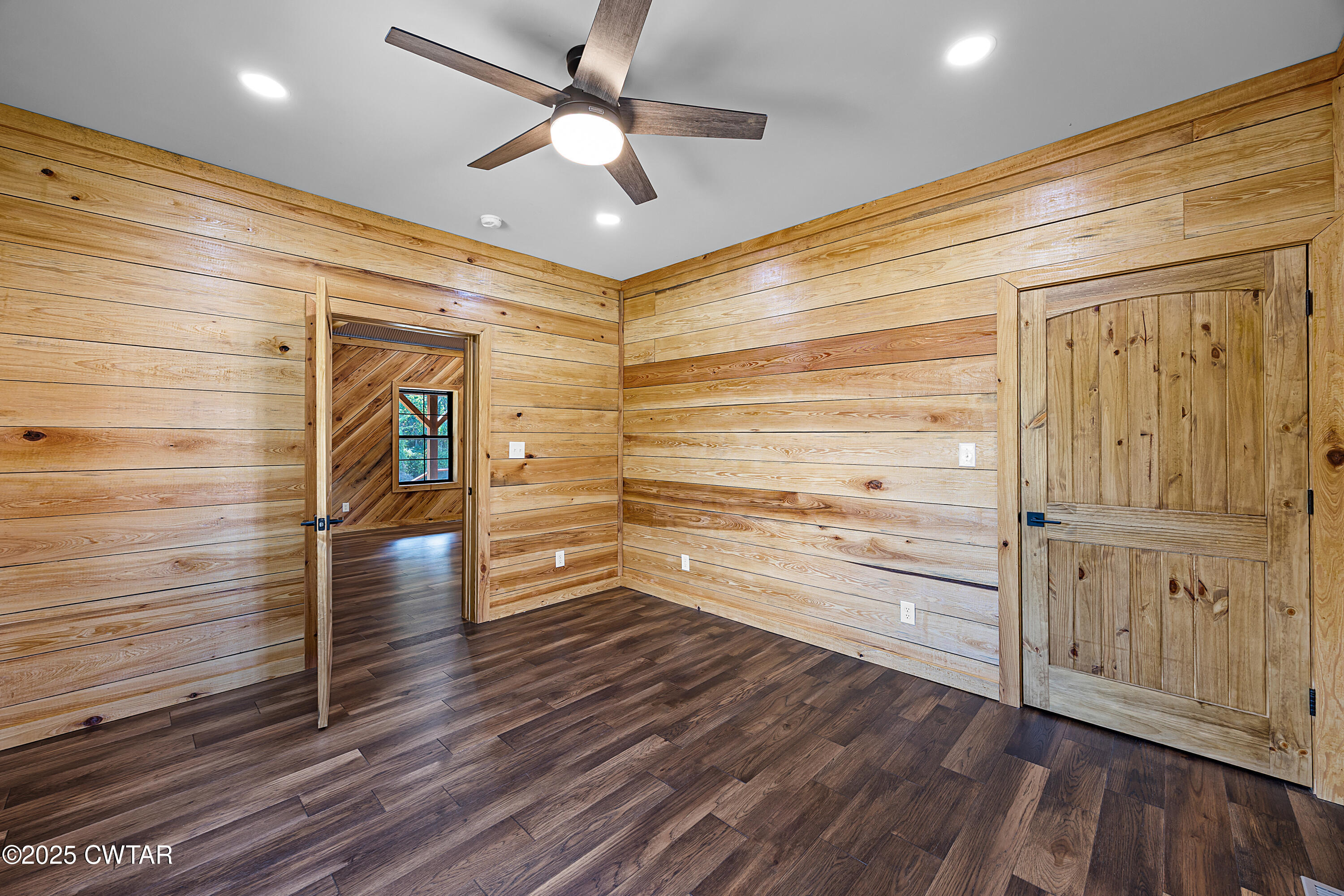 820 Tyson Road Toone, TN 38381 - Photo 24 of 31 a view of walk in closet with wooden floor
