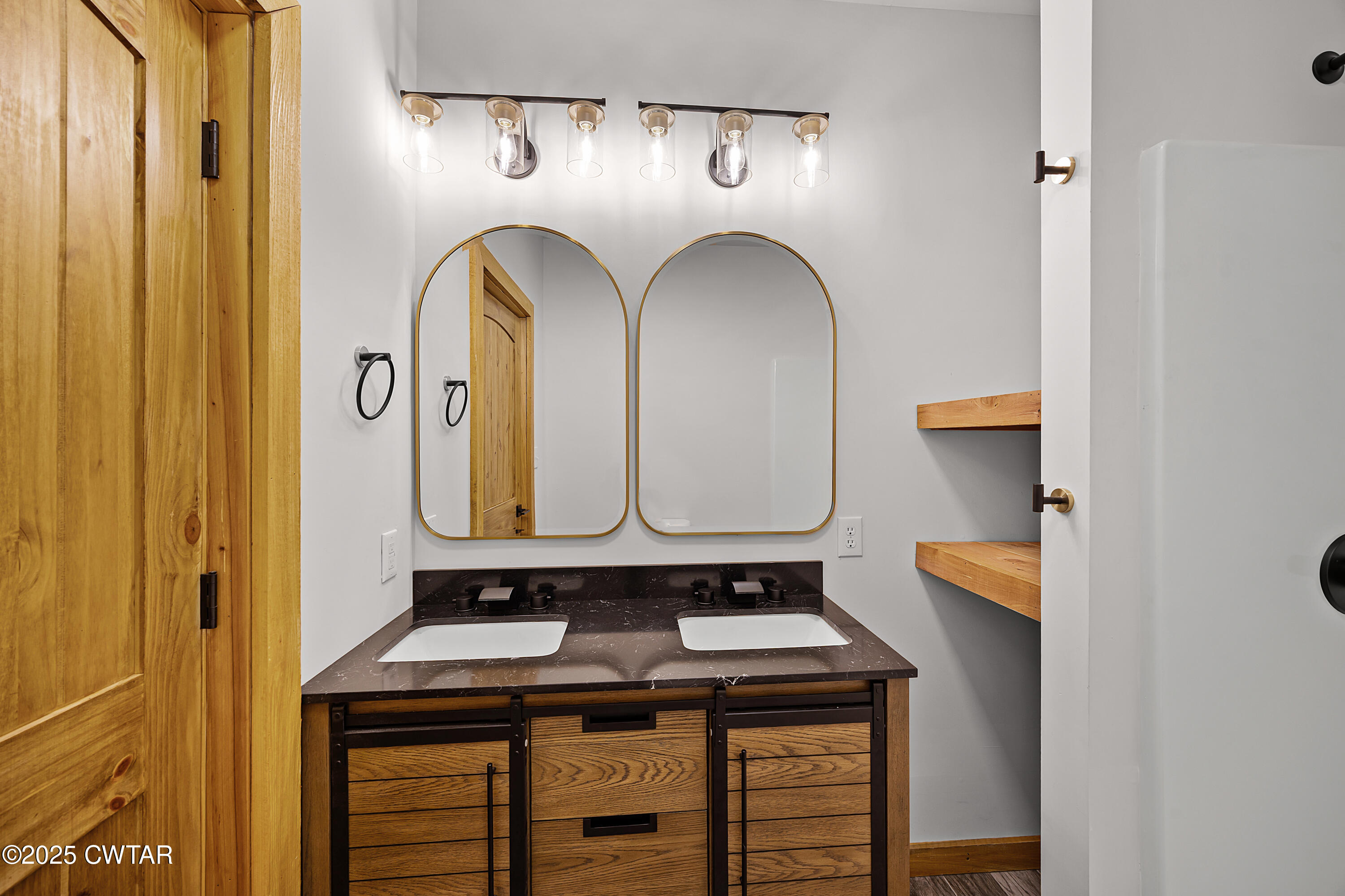 820 Tyson Road Toone, TN 38381 - Photo 27 of 31 a bathroom with a sink and a mirror