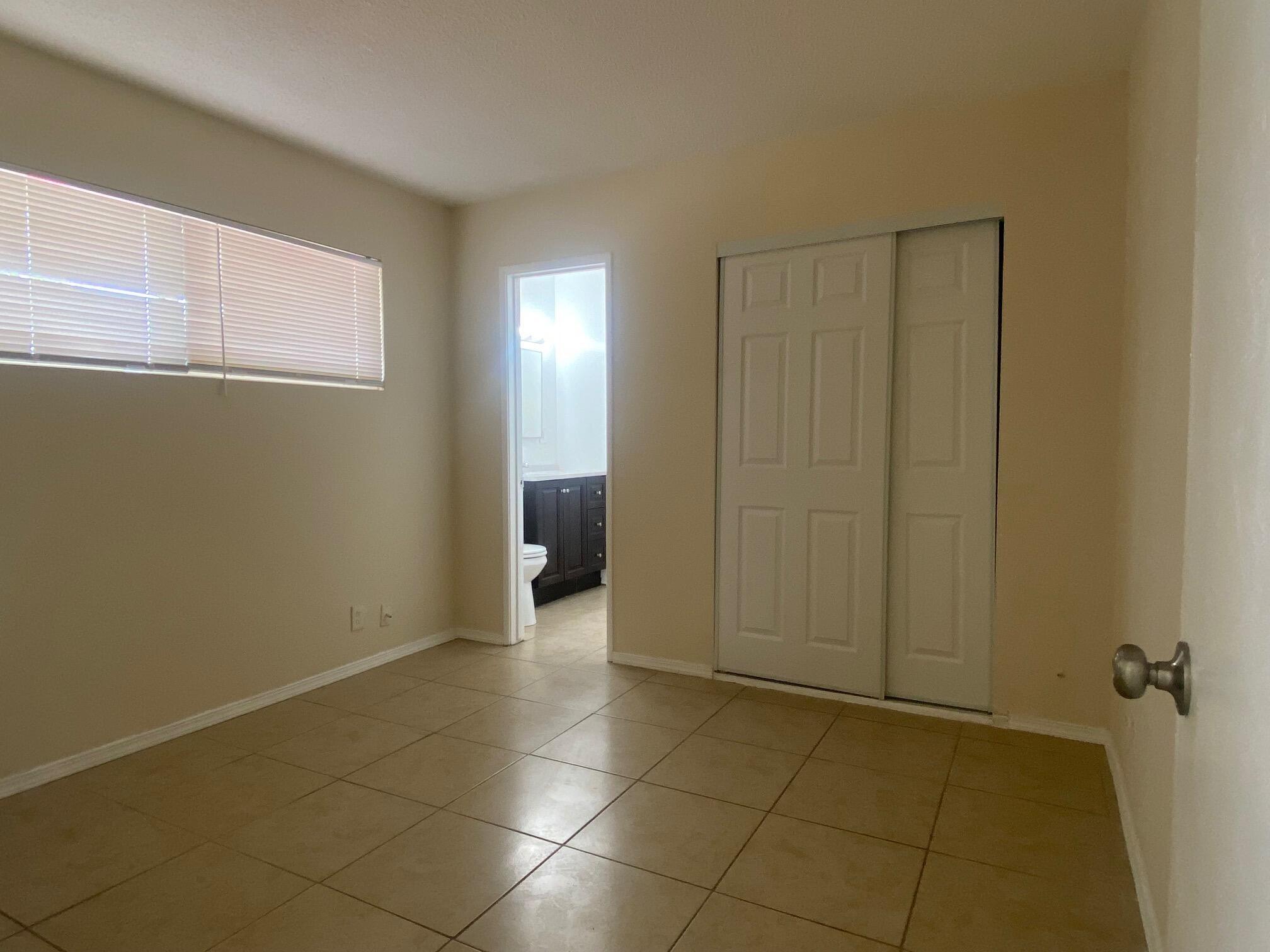 45325 Raysack Avenue Lancaster, CA 93535 - Photo 11 of 17 an empty room with a bathroom