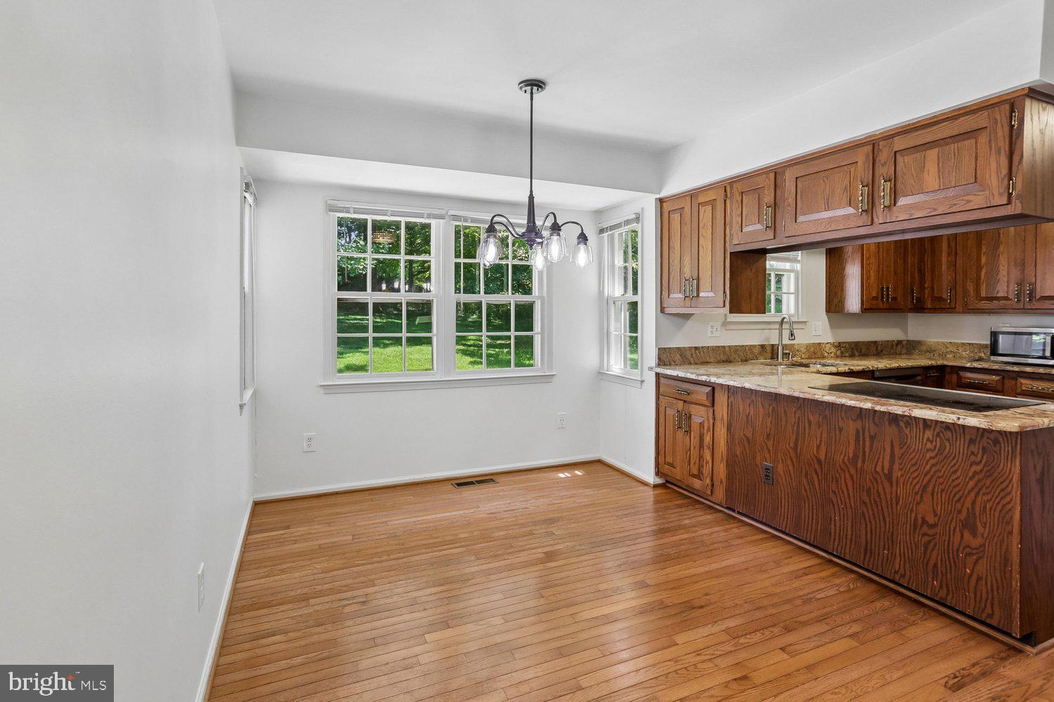 903 Ridge Drive McLean, VA 22101 - Photo 19 of 46 Breakfast area hardwood flooring