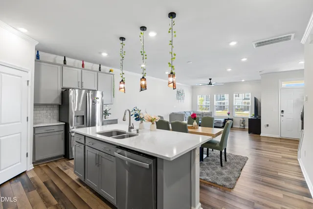 a bedroom with a bed and cabinets