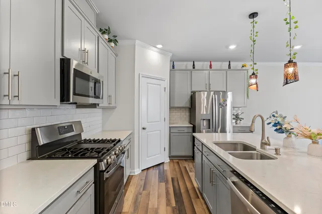 a bedroom with a bed and a desk