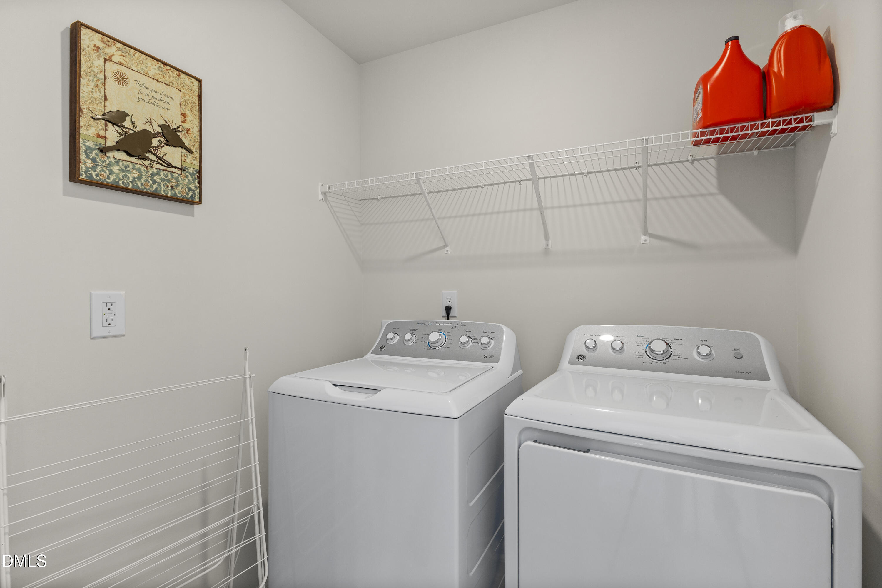 1811 Aspen River Lane Apex, NC 27502 - Photo 22 of 36 a utility room with dryer and washer