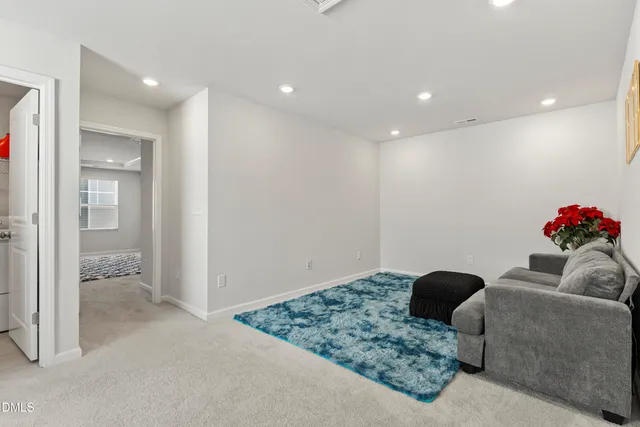 a view of swimming pool with seating area and hardwood roof
