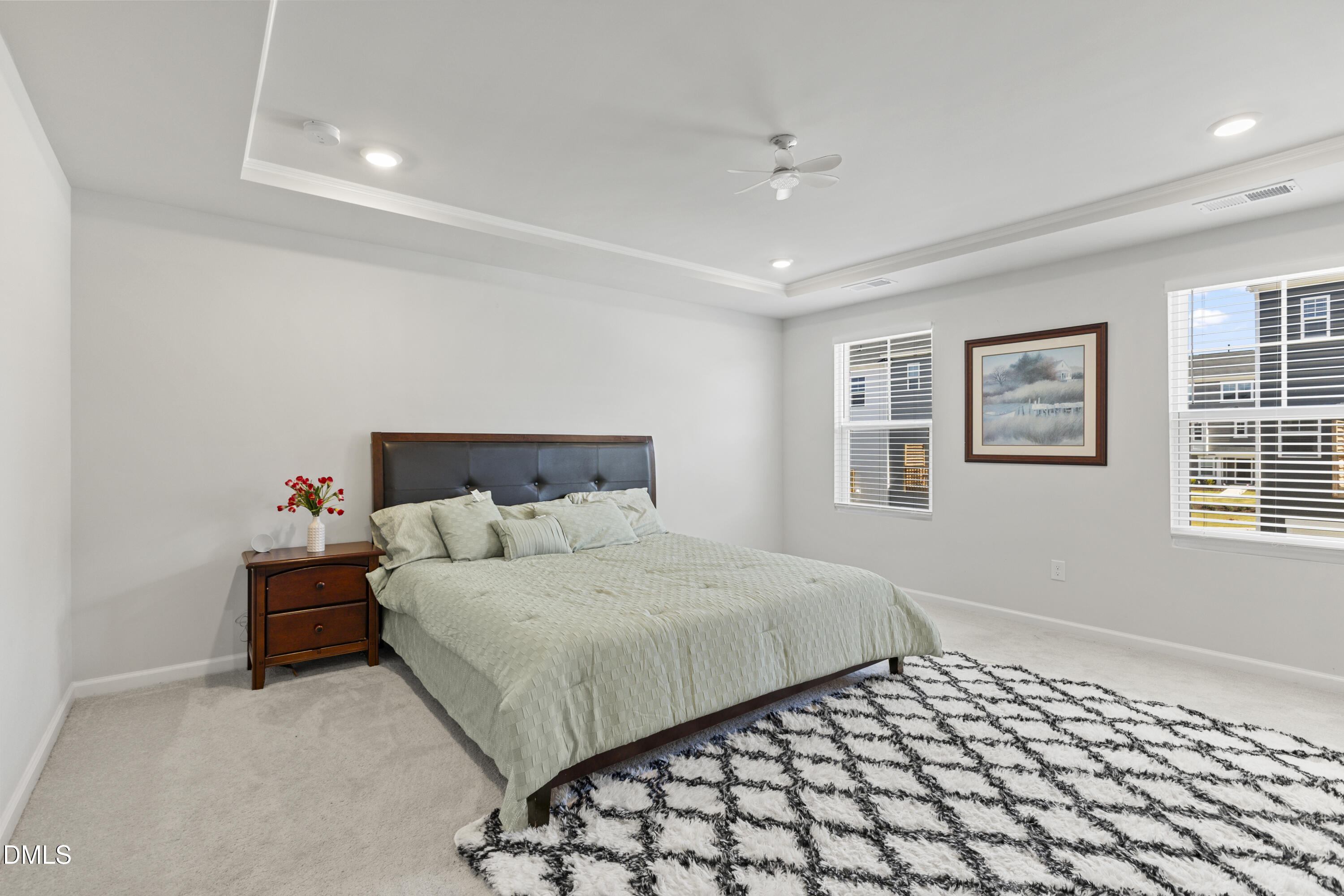 1811 Aspen River Lane Apex, NC 27502 - Photo 29 of 36 a bedroom with a bed and a window