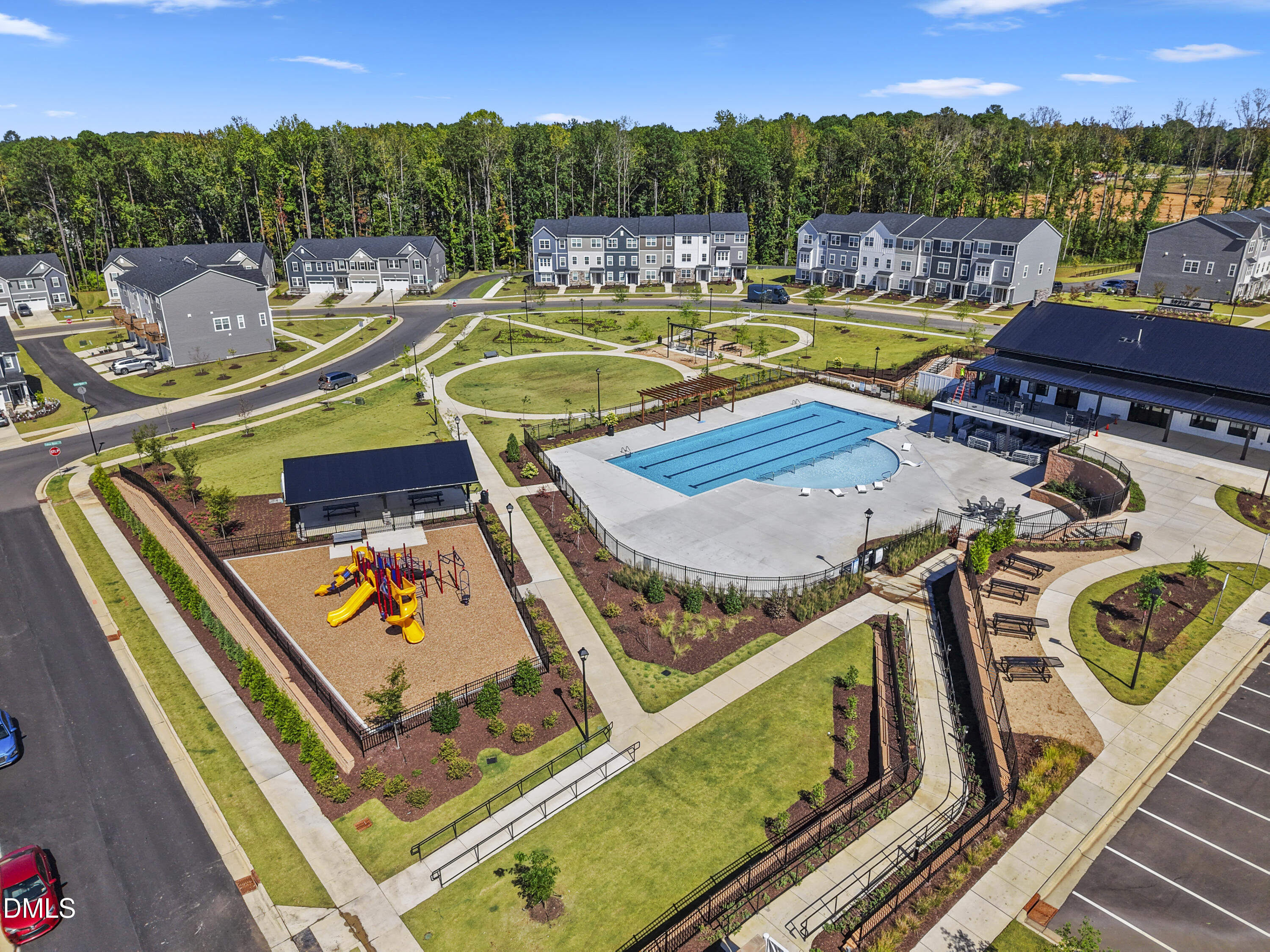 1811 Aspen River Lane Apex, NC 27502 - Photo 31 of 36 a view of a swimming pool with a patio and a mountain view