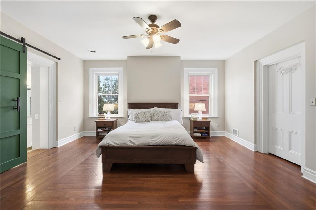 1311 Breed Street Pittsburgh, PA 15203 - Photo 21 of 44 a bedroom with a bed and window