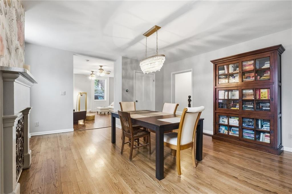1311 Breed Street Pittsburgh, PA 15203 - Photo 10 of 44 a view of a dining room with furniture and wooden floor