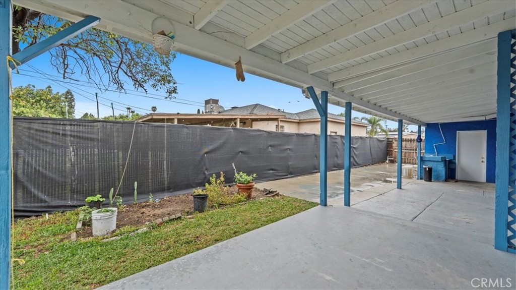 742 South Magnolia Avenue Rialto, CA 92376 - Photo 16 of 19 a view of a backyard with plants and a patio
