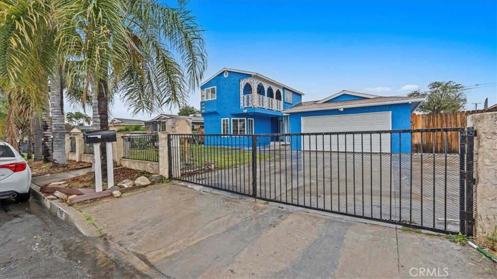 742 South Magnolia Avenue Rialto, CA 92376 - Photo 2 of 19 a view of a house with a wooden deck