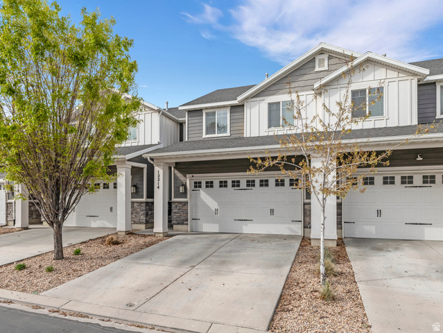 12214 Sunpark Lane Draper, UT 84020 - Photo 2 of 24 View of front of property with driveway, board and batten siding, a garage, and a shingled roof