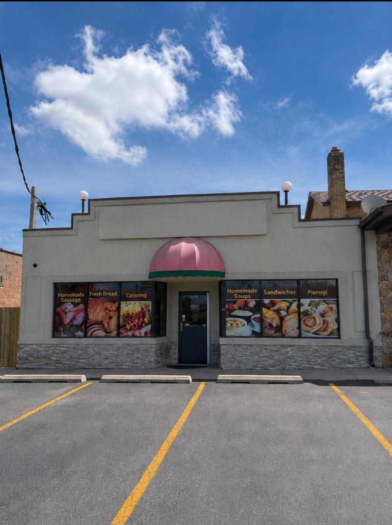 272 West Irving Park Road Wood Dale, IL 60191 - Photo 1 of 12 front view of a building with a street