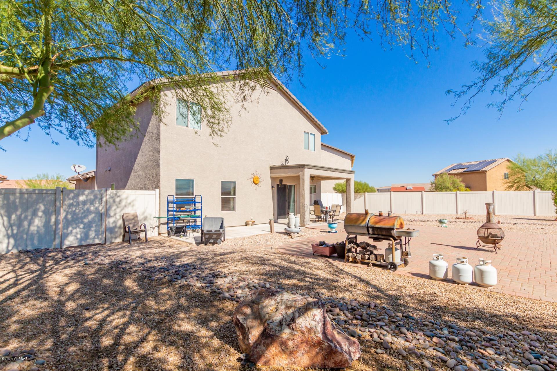 21203 East Reunion Road Red Rock, AZ 85145 - Photo 23 of 26 a view of a house with backyard porch and sitting area