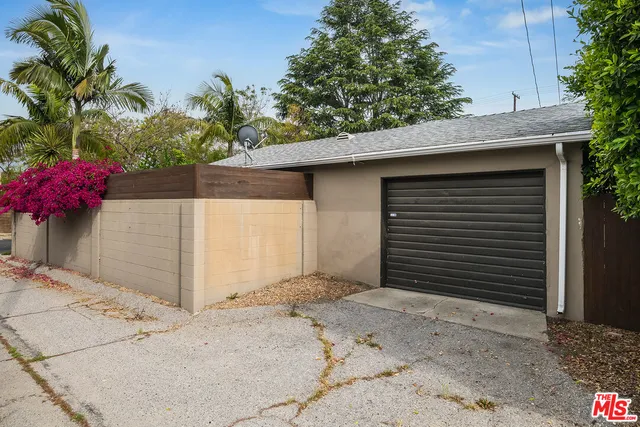 a front view of a house with a garage