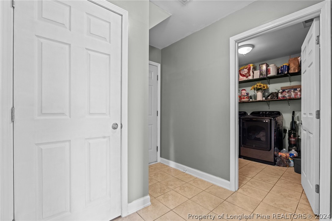 176 Clearbrook Place Raeford, NC 28376 - Photo 17 of 36 a view of a hallway and a livingroom with a hallway