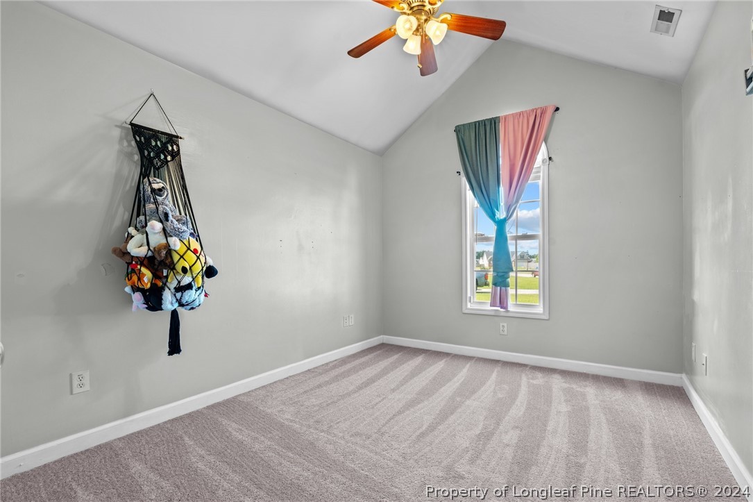 176 Clearbrook Place Raeford, NC 28376 - Photo 21 of 36 a view of empty room with window and ceiling fan