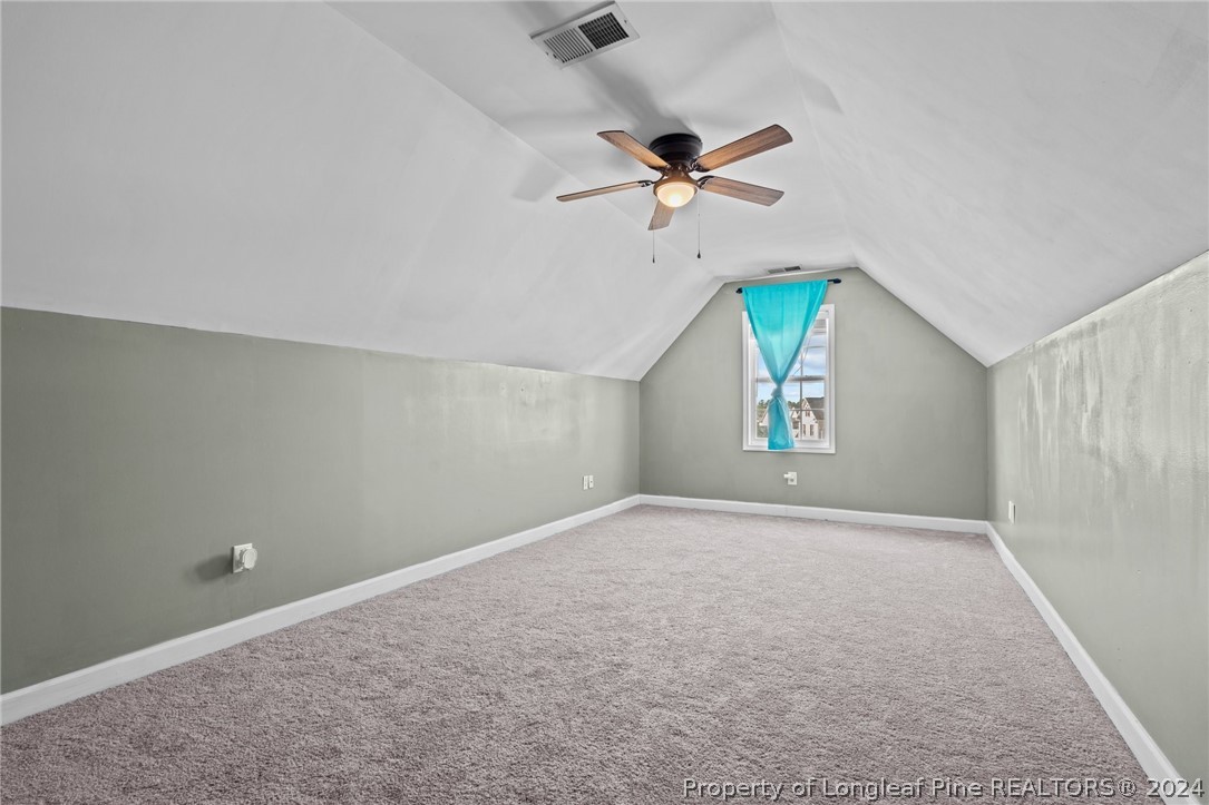 176 Clearbrook Place Raeford, NC 28376 - Photo 30 of 36 an empty room with windows and fan
