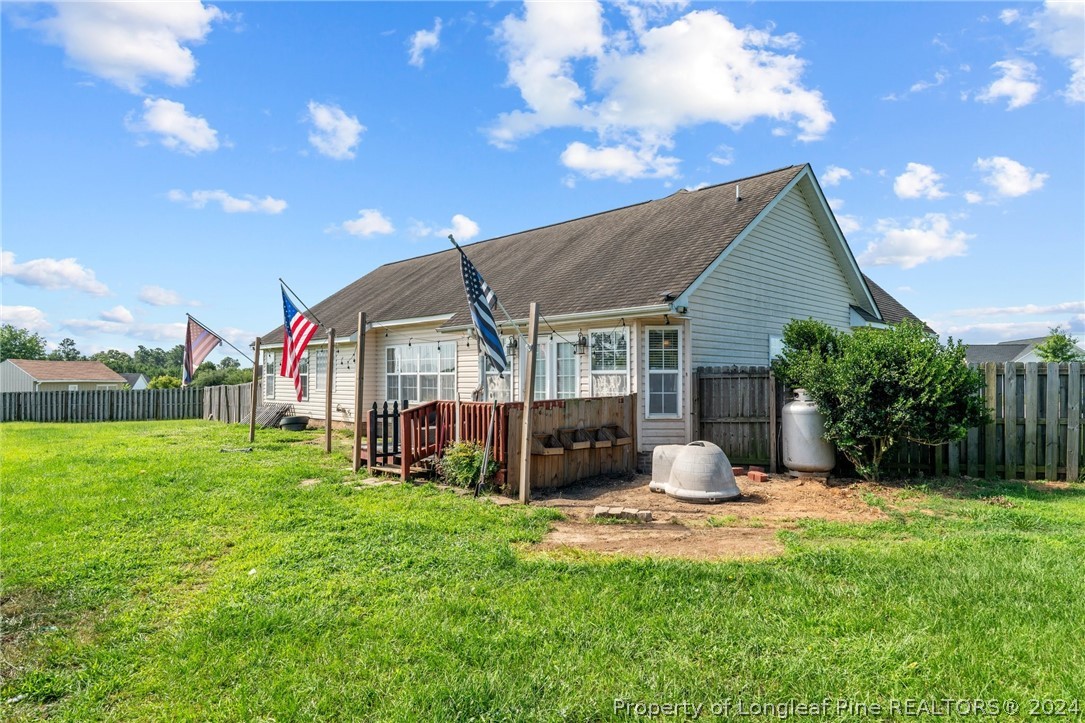 176 Clearbrook Place Raeford, NC 28376 - Photo 33 of 36 a front view of house with yard and green space