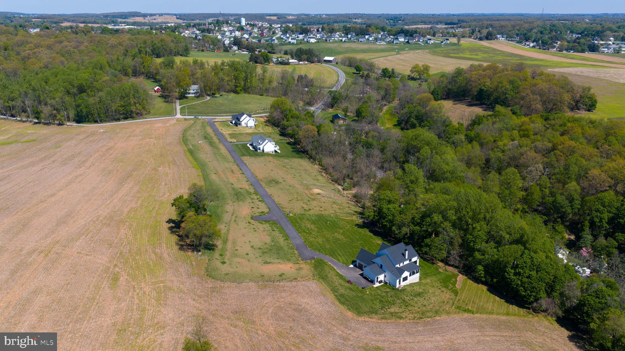 7 Harambe Overlook Railroad, PA 17355 - Photo 6 of 15 an aerial view of a house with a yard and lake view