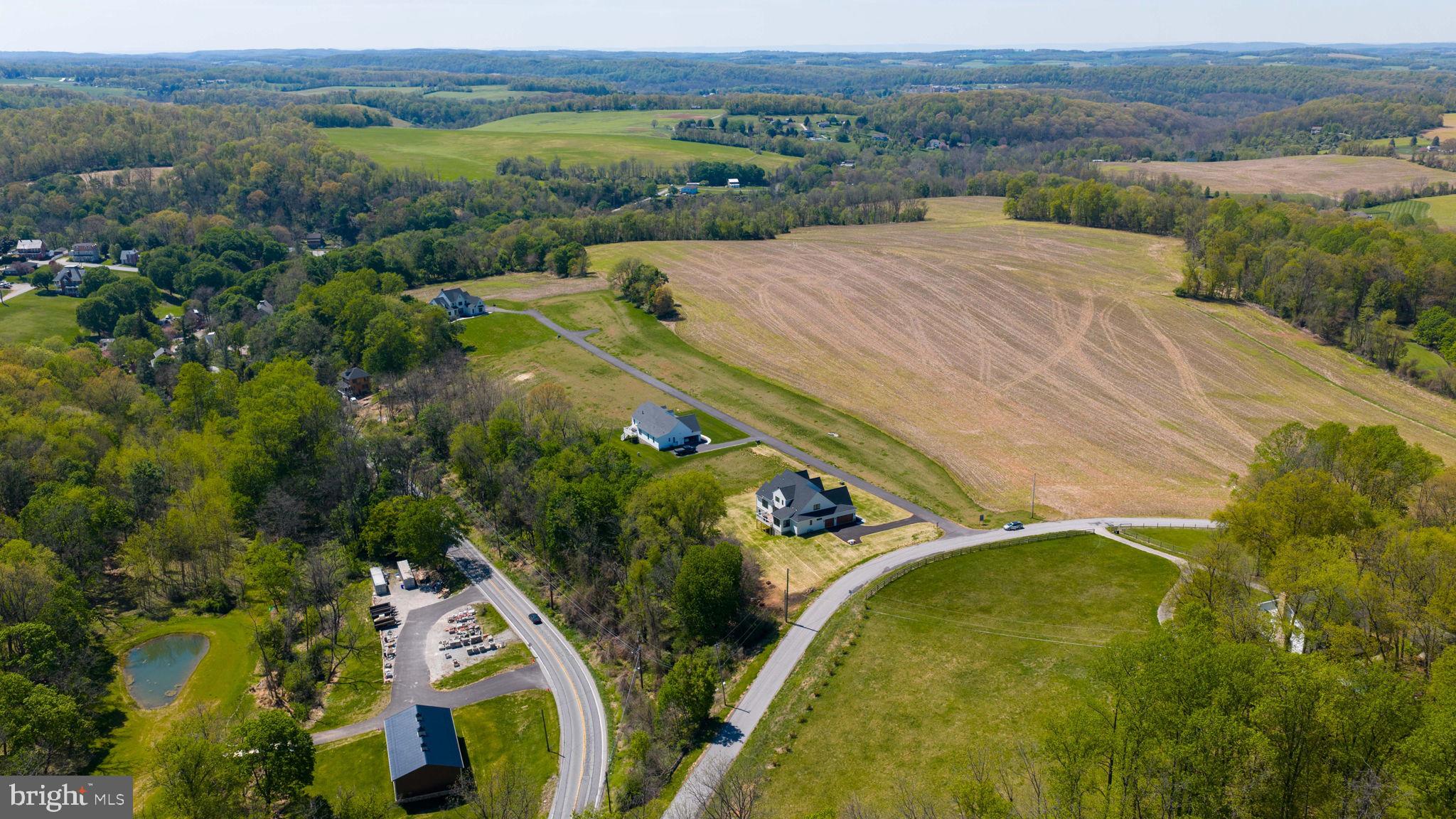 7 Harambe Overlook Railroad, PA 17355 - Photo 10 of 15 an aerial view of a house with a yard basket ball court and outdoor seating