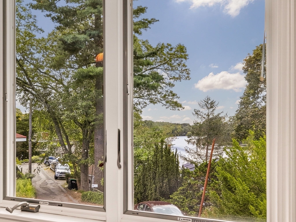 15 Crest Road Wayland, MA 01778 - Photo 11 of 36 a view of a window and a tree