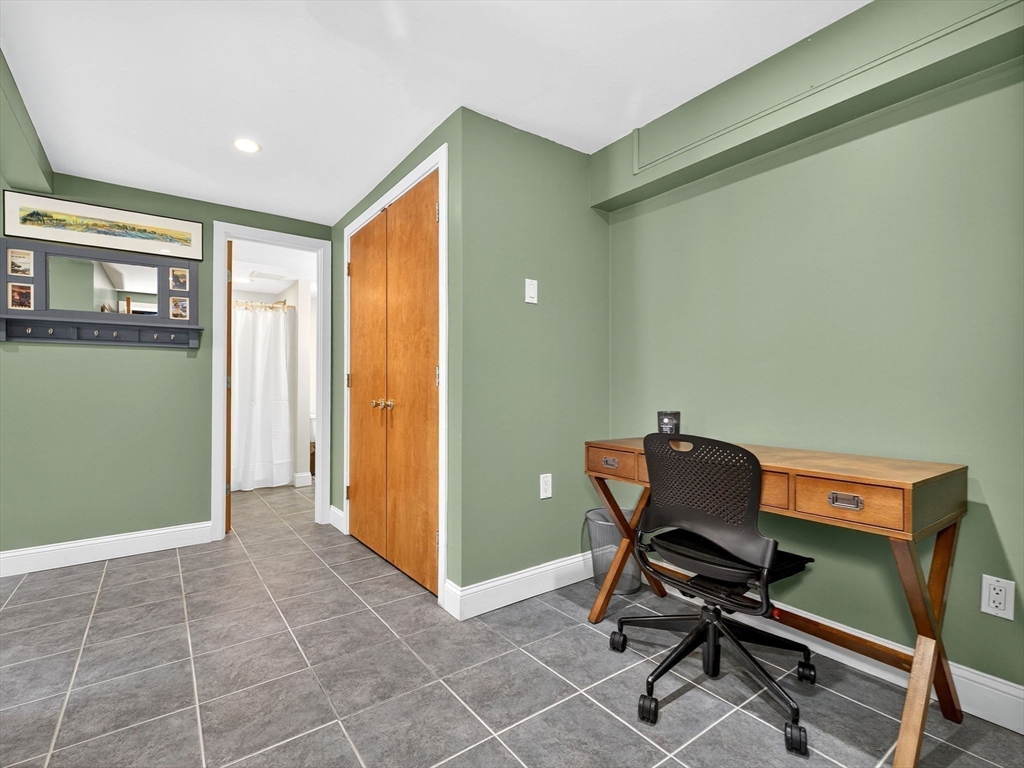 15 Crest Road Wayland, MA 01778 - Photo 18 of 36 a view of a workspace with furniture and a window
