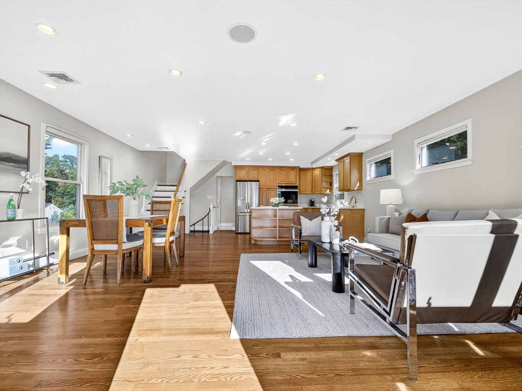 15 Crest Road Wayland, MA 01778 - Photo 2 of 36 a living room with lots of furniture and kitchen view
