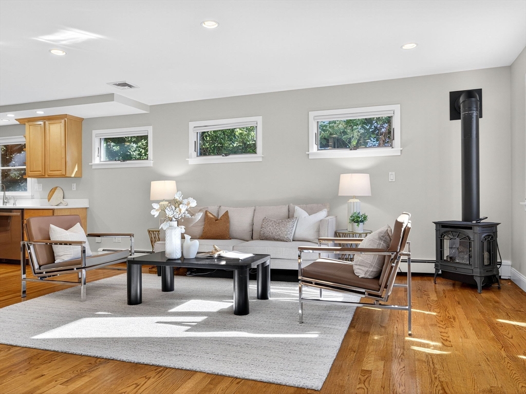 15 Crest Road Wayland, MA 01778 - Photo 3 of 36 a living room with furniture and a table
