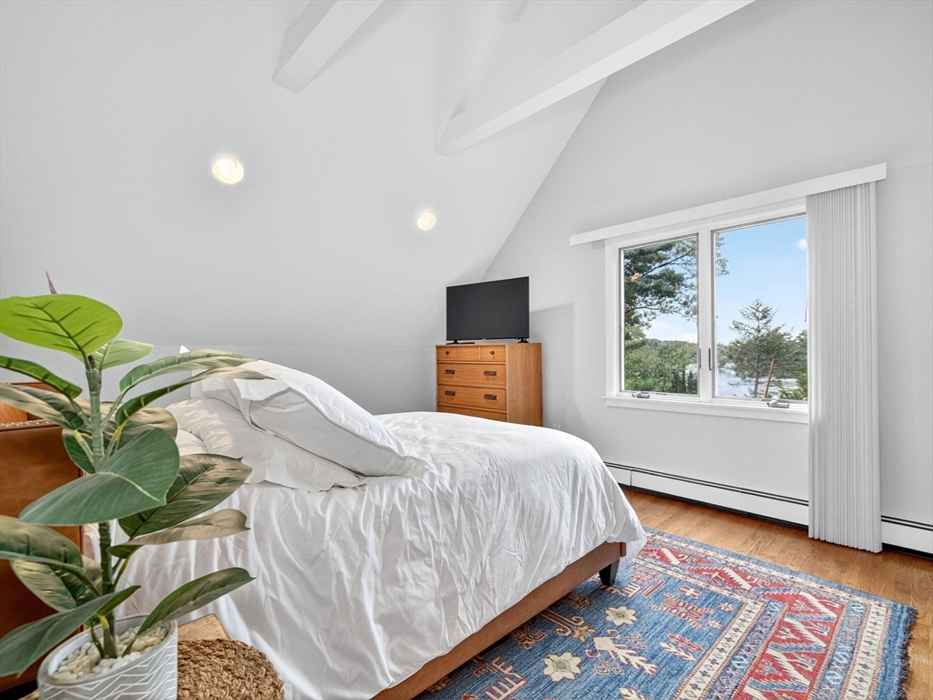 15 Crest Road Wayland, MA 01778 - Photo 10 of 36 a bedroom with a bed and window