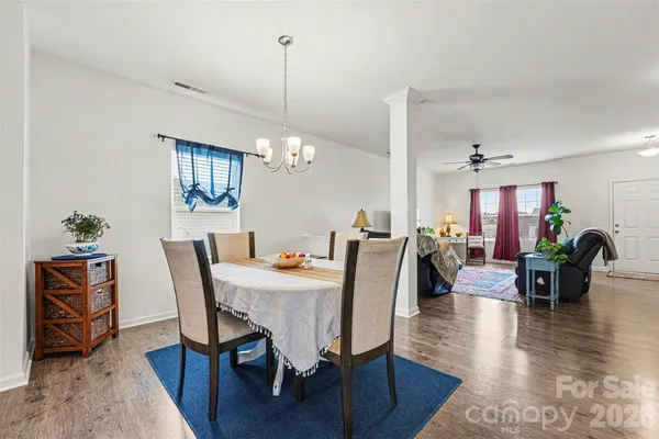 a view of a dining room with furniture