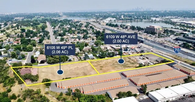 an aerial view of a swimming pool and mountain view