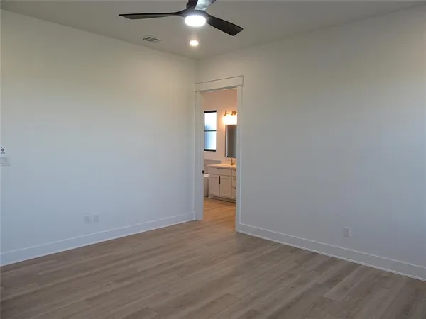 a view of an empty walk in closet