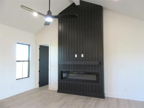 a kitchen with stainless steel appliances granite countertop a sink a stove and refrigerator