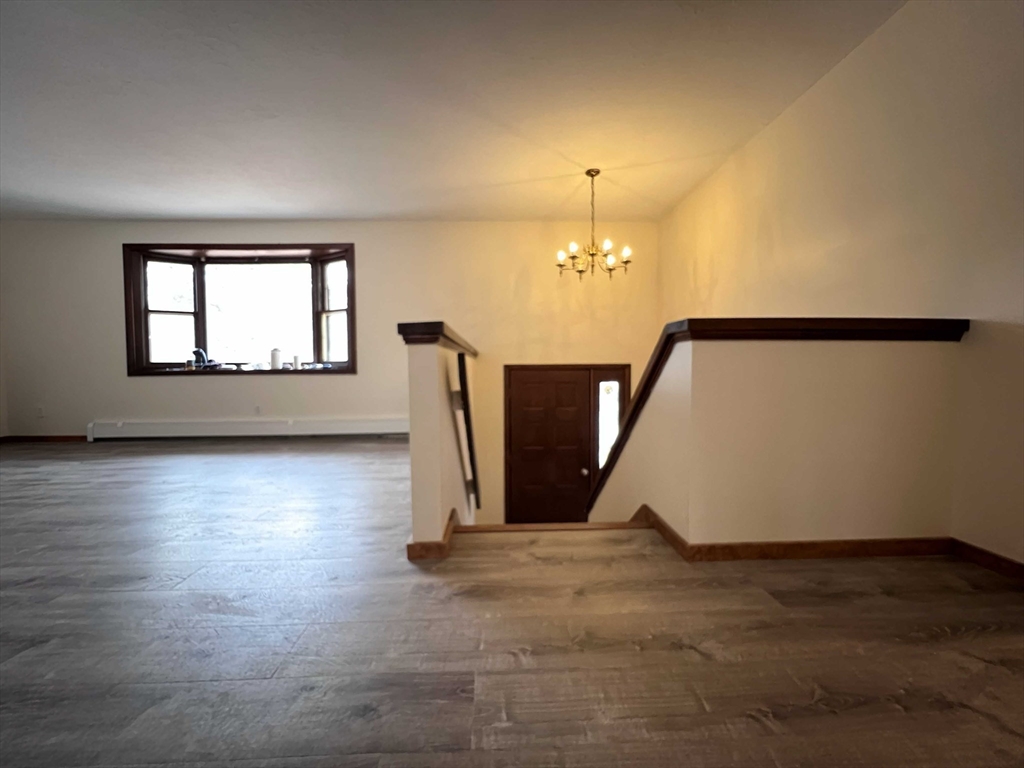 23 Hospital Road Templeton, MA 01436 - Photo 2 of 32 a view of a livingroom with wooden floor