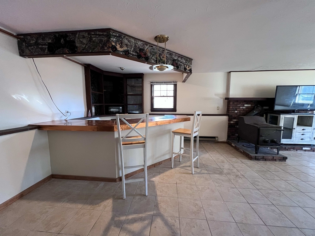 23 Hospital Road Templeton, MA 01436 - Photo 28 of 32 a view of a house with sitting area