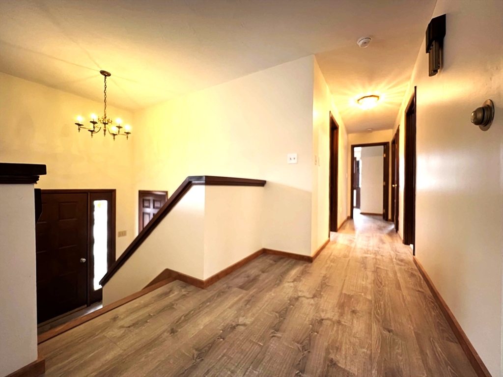 23 Hospital Road Templeton, MA 01436 - Photo 9 of 32 a view of a hallway view with staircase