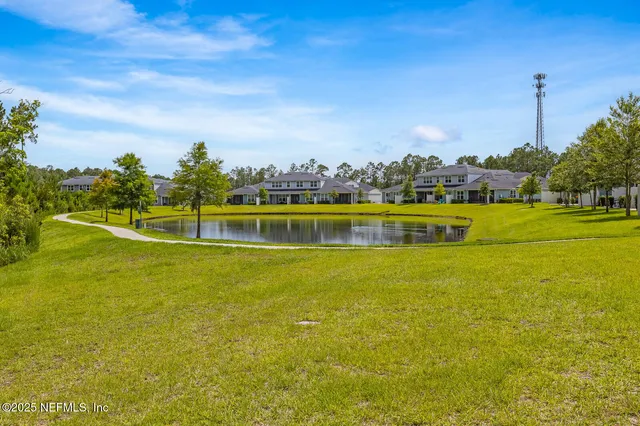 a view of an ocean with a city view