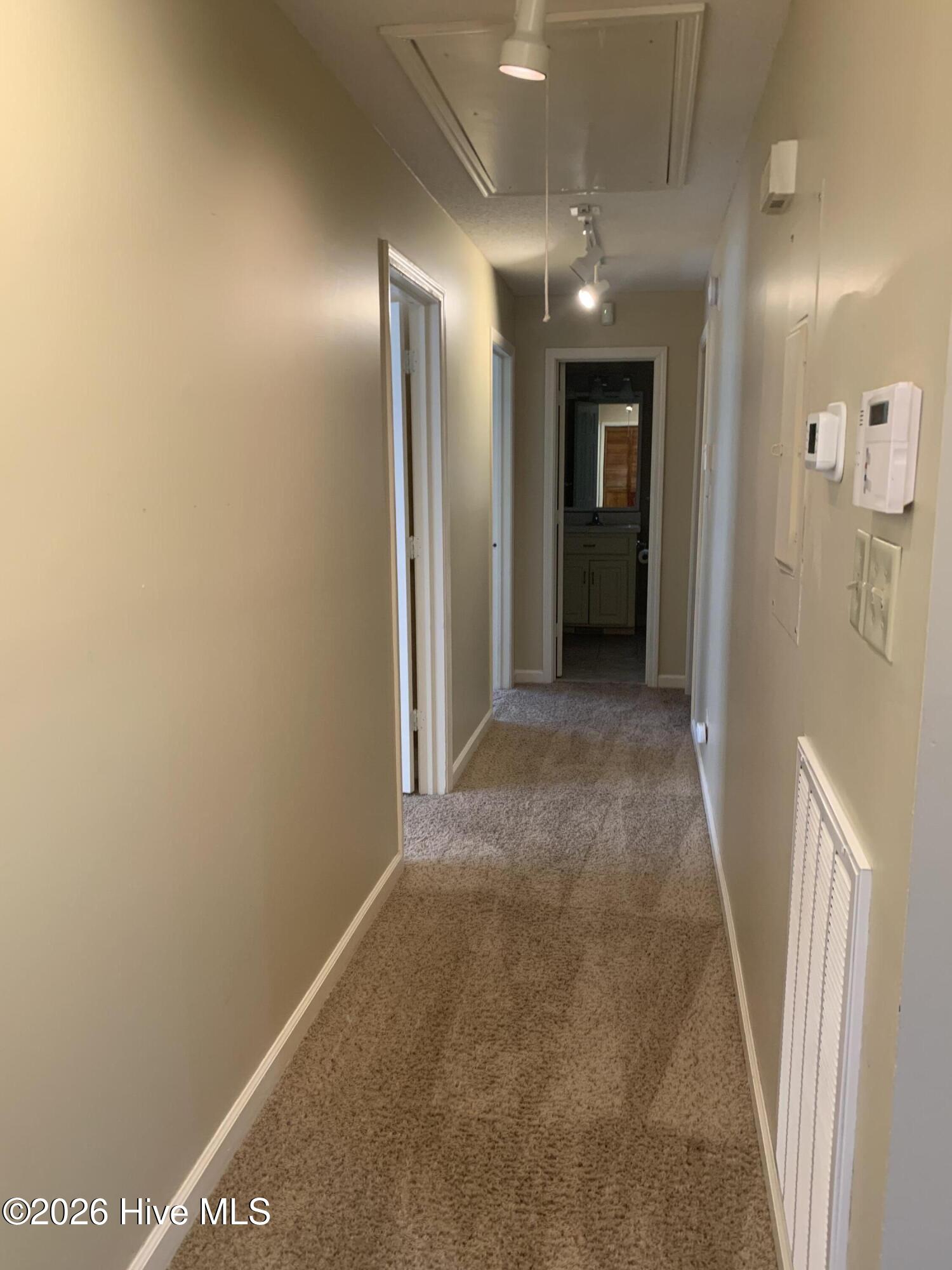 1129 Strawbush Road Rocky Mount, NC 27804 - Photo 13 of 28 Hall way to bedrooms