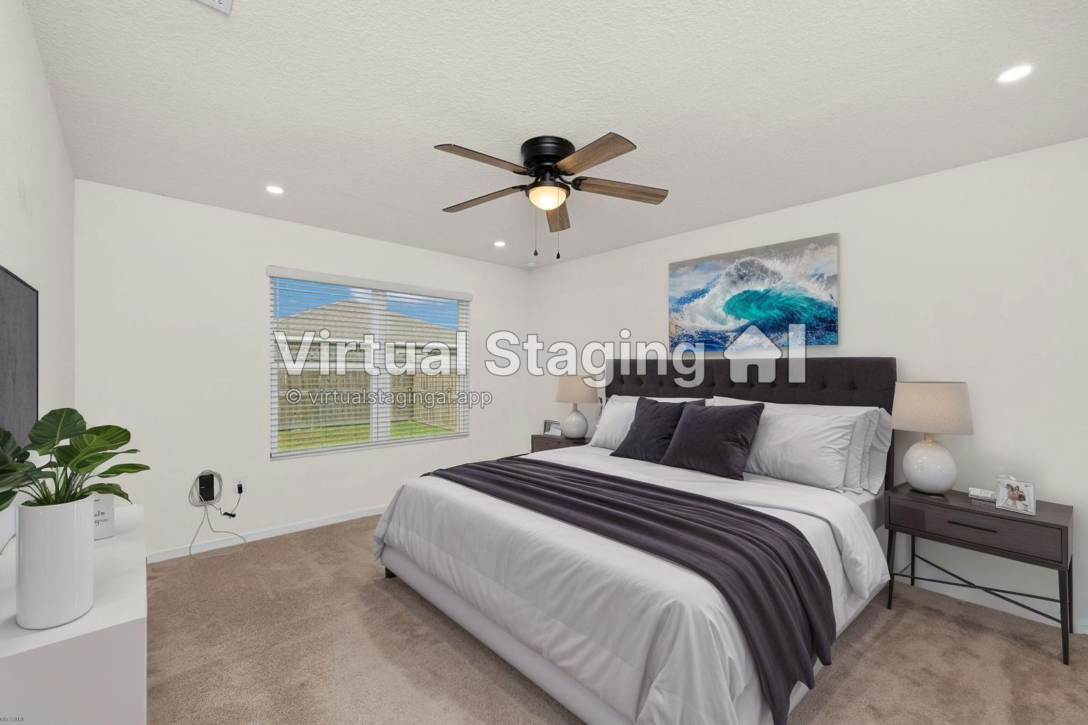 920 Merganser Way Crestview, FL 32539 - Photo 15 of 39 a bedroom with bed and a potted plant