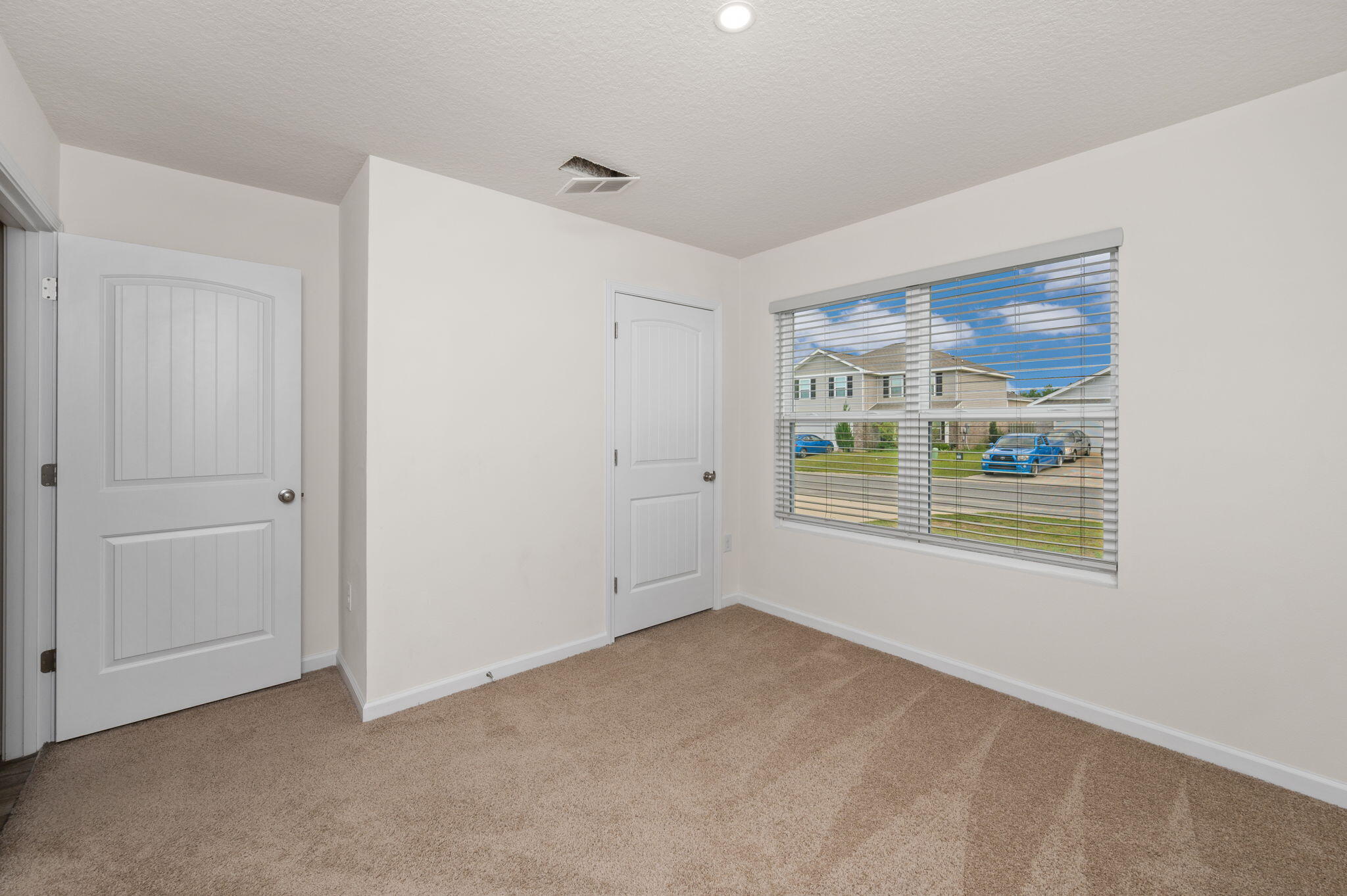 920 Merganser Way Crestview, FL 32539 - Photo 22 of 39 a view of an empty room with a window