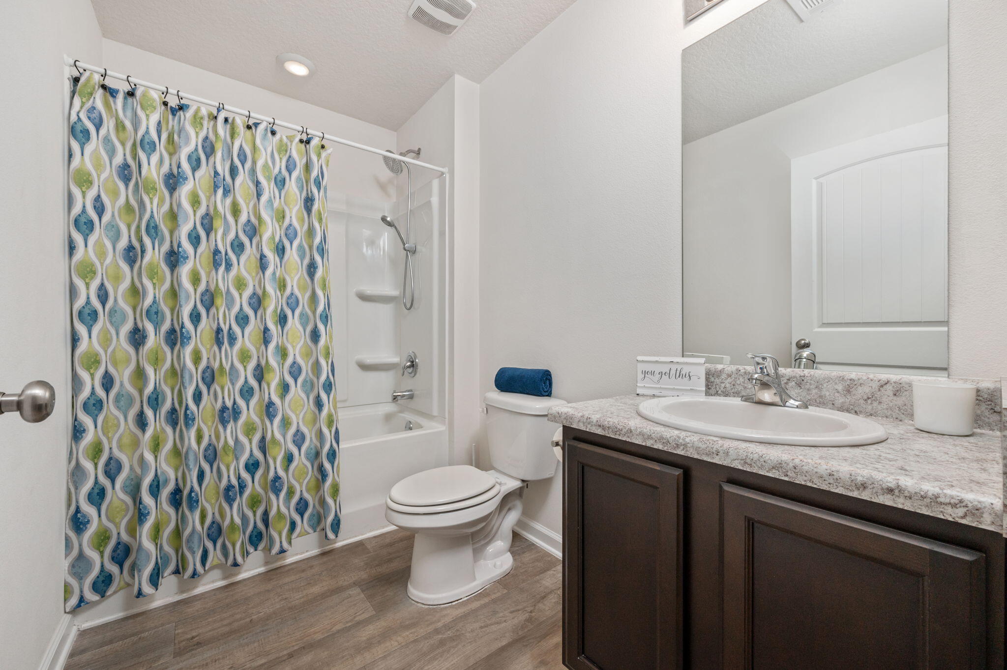 920 Merganser Way Crestview, FL 32539 - Photo 23 of 39 a bathroom with a granite countertop sink toilet and shower