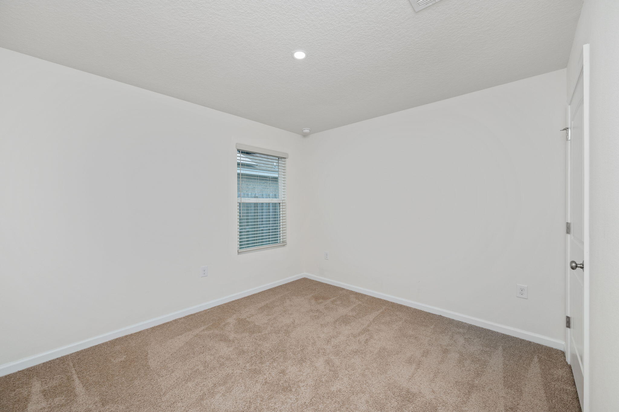 920 Merganser Way Crestview, FL 32539 - Photo 25 of 39 an empty room with windows