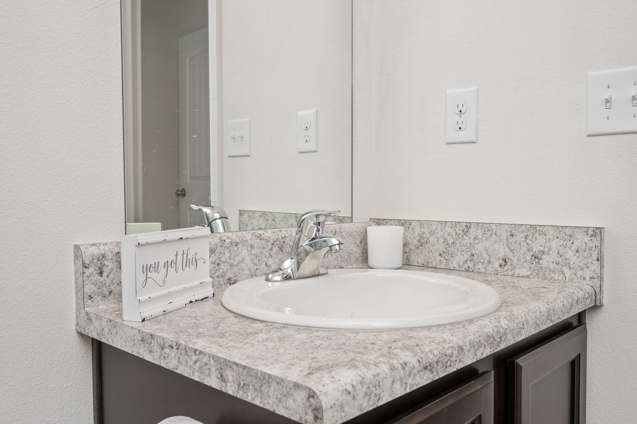 920 Merganser Way Crestview, FL 32539 - Photo 29 of 39 a bathroom with a granite countertop sink and a mirror