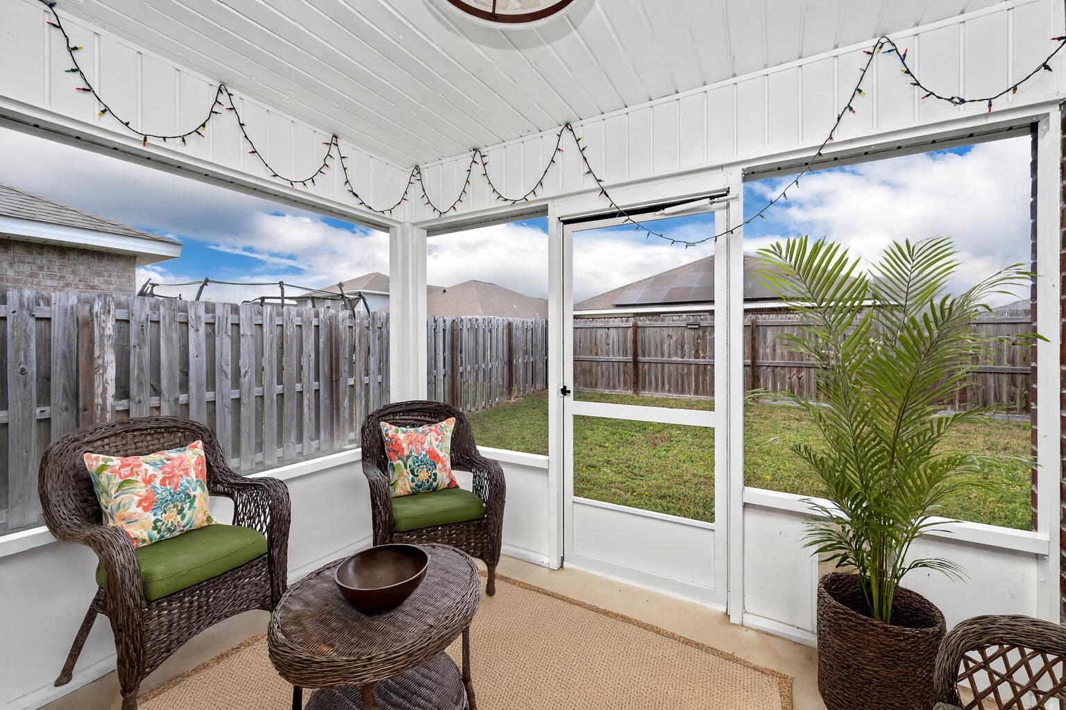 920 Merganser Way Crestview, FL 32539 - Photo 31 of 39 a balcony with furniture and a potted plant